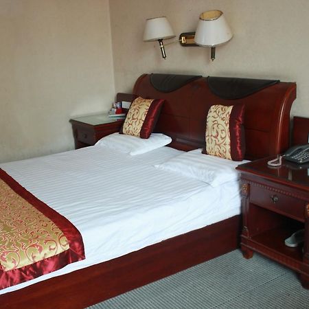 Taizhou Taishan Business Hotel Szoba fotó