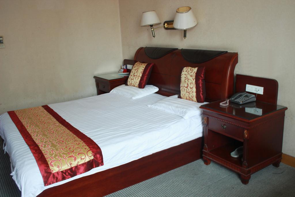 Taizhou Taishan Business Hotel Szoba fotó